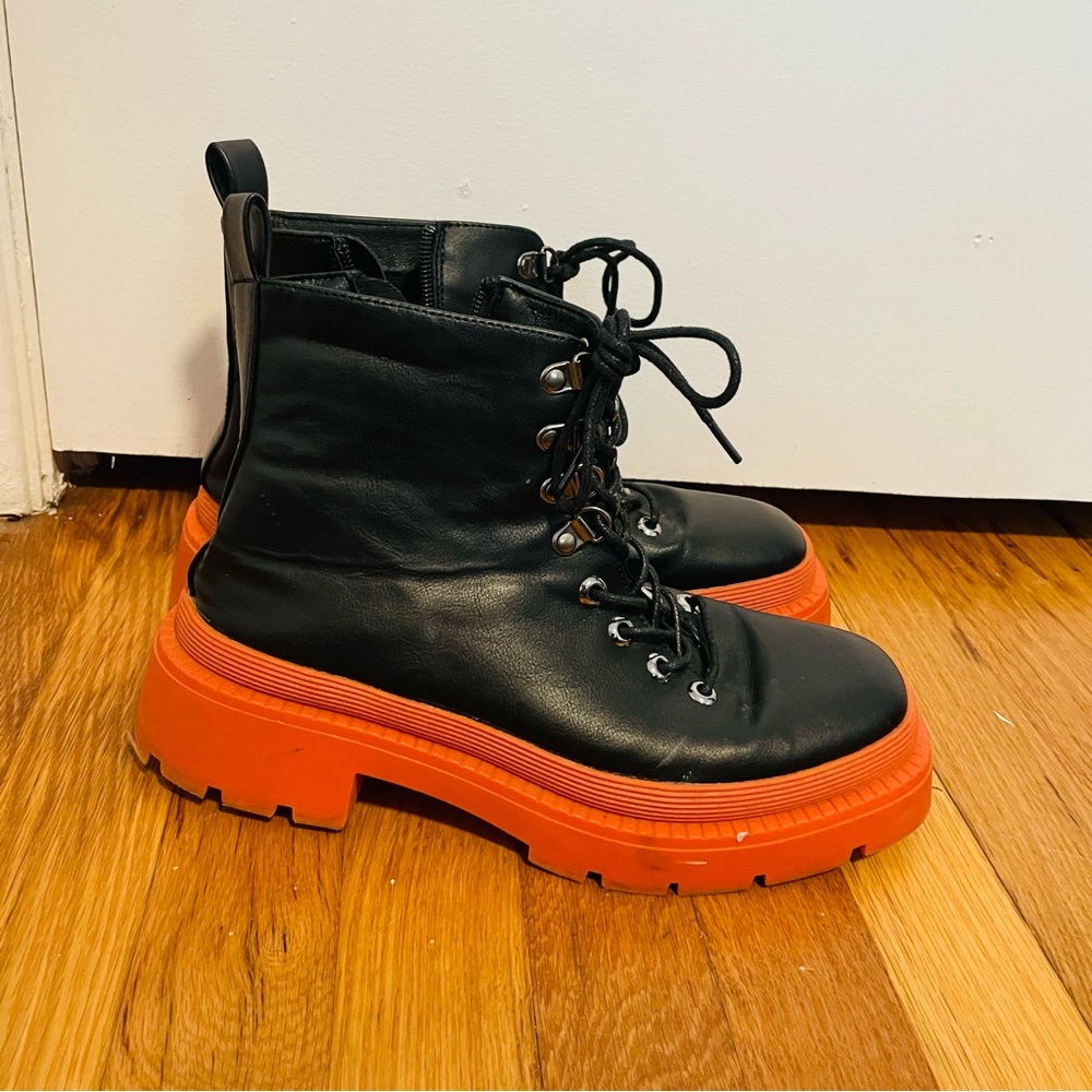 Ocho Black Faux Leather Platform Boots with Orange Sole Women's